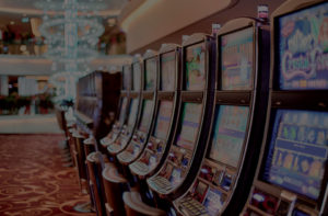 Slot machines lined up in a casino